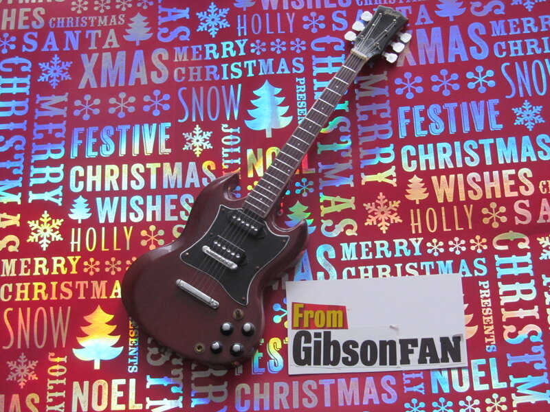 Brown Electric Guitar — Red