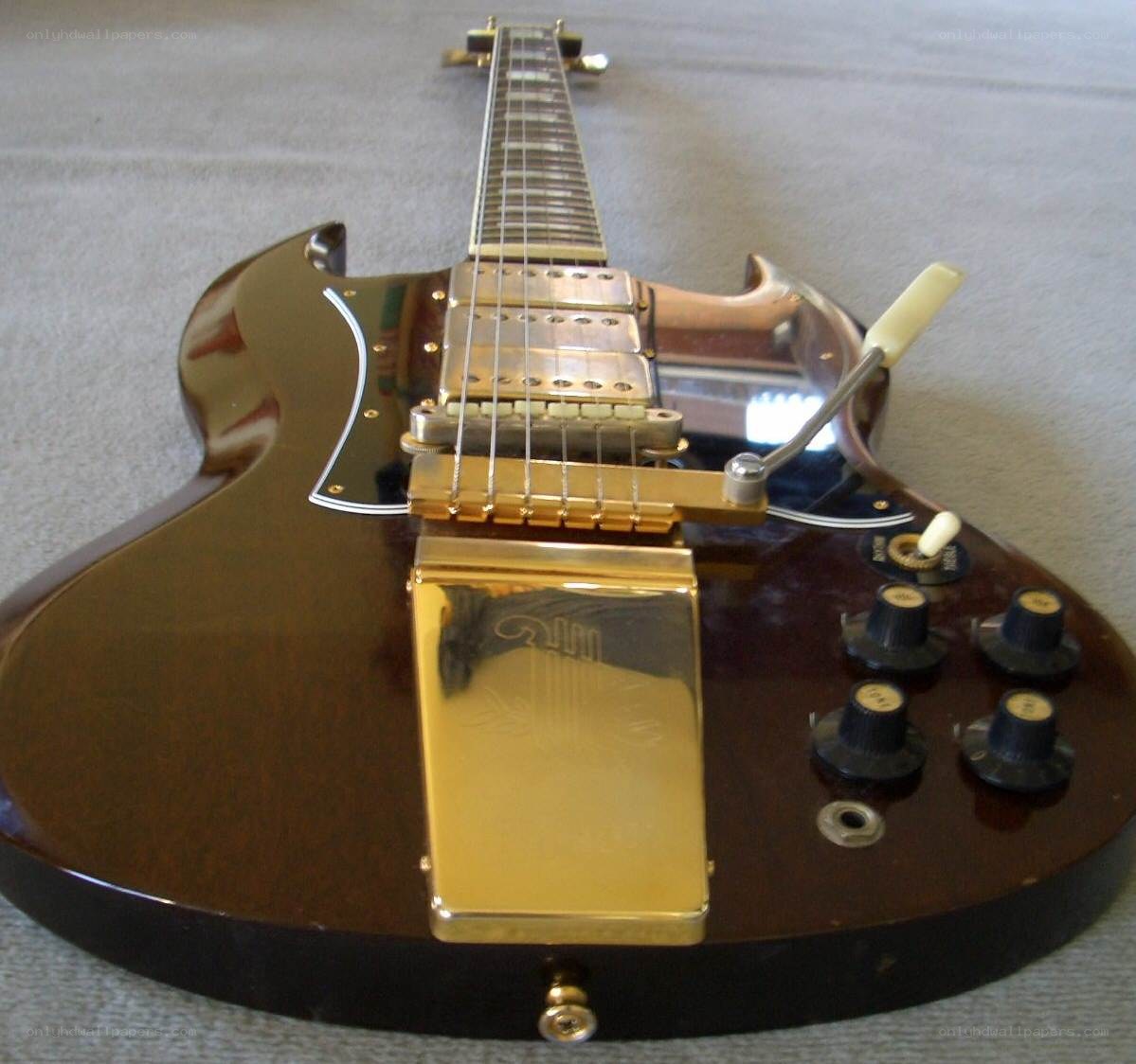 brown electric guitar