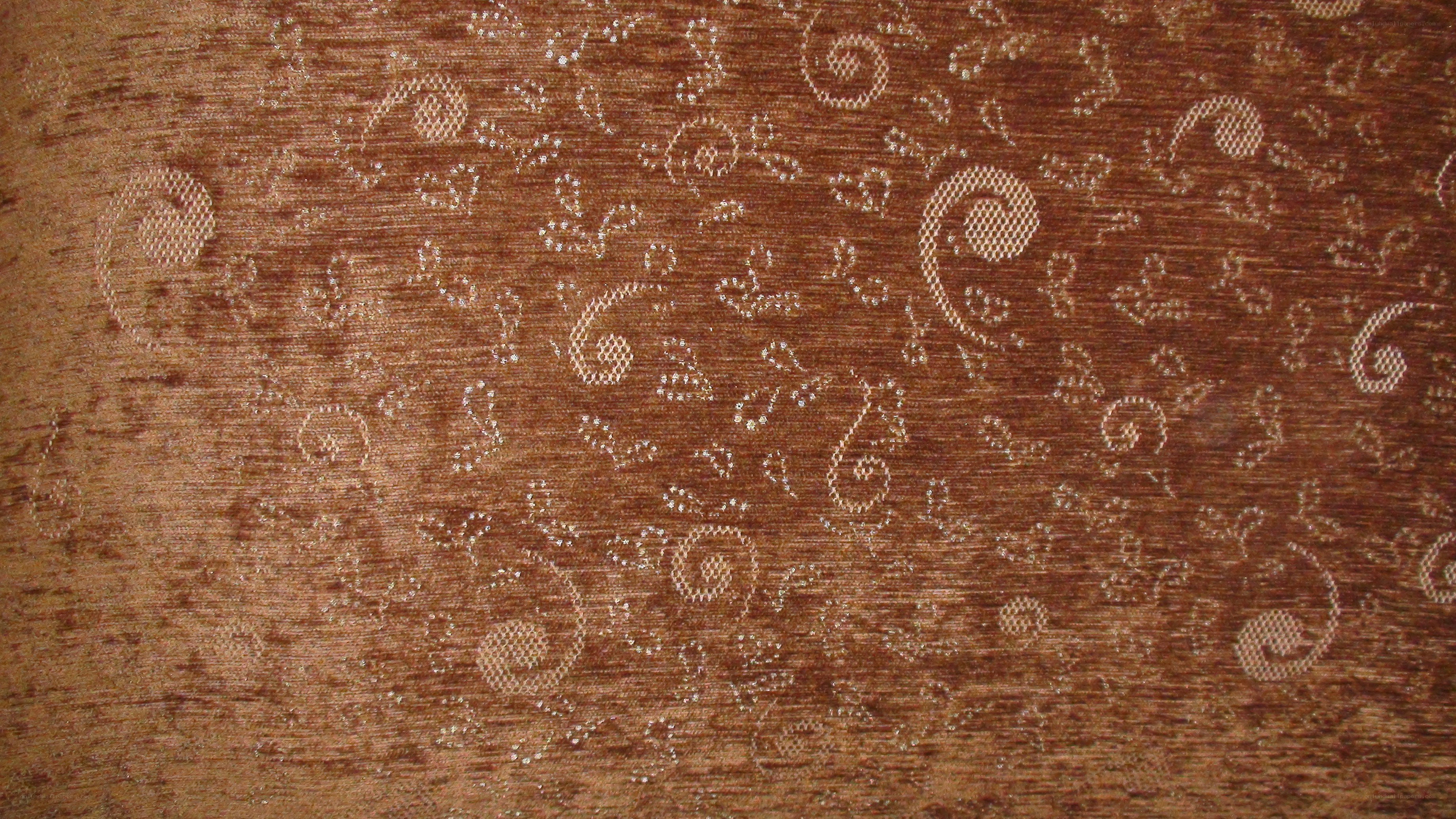 brown fabric with swirl pattern