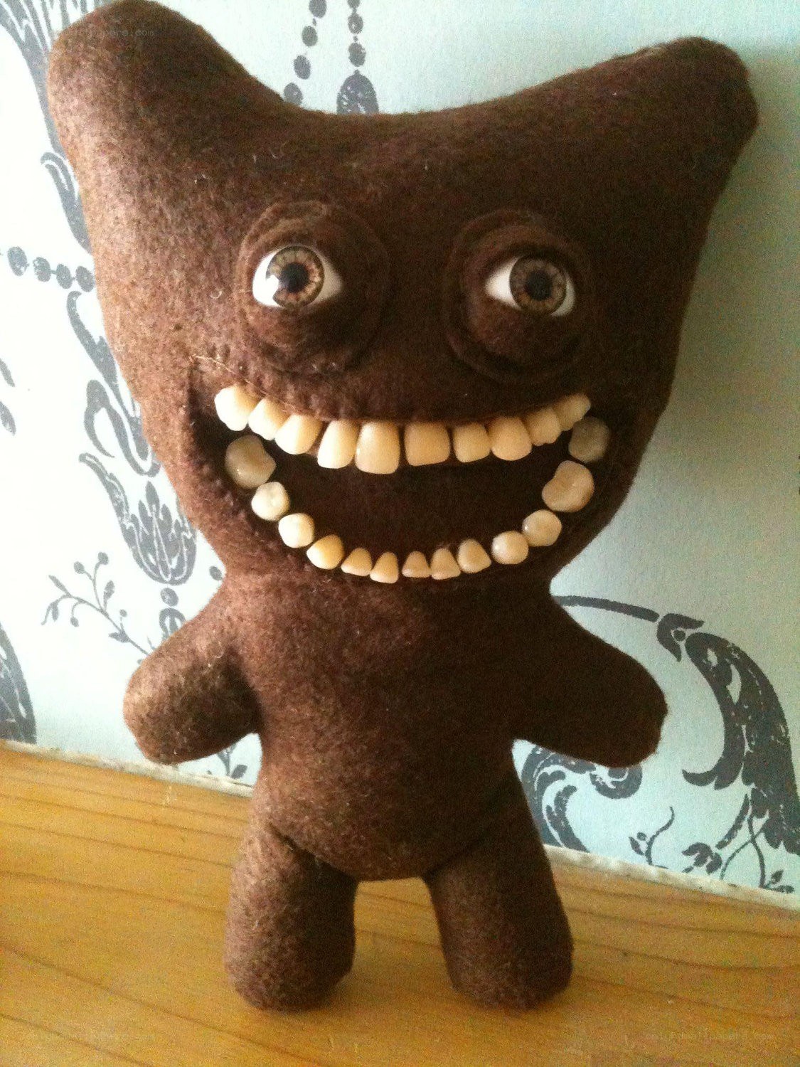 brown felt monster toy