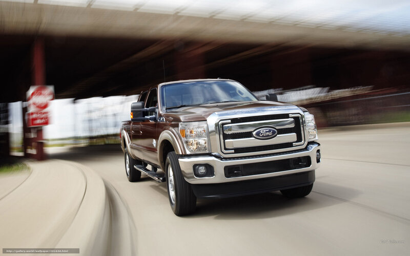 Brown Ford F-150 driving on road