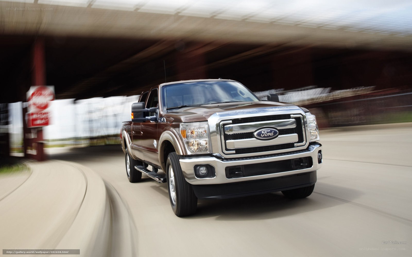Brown Ford F-150 driving on road