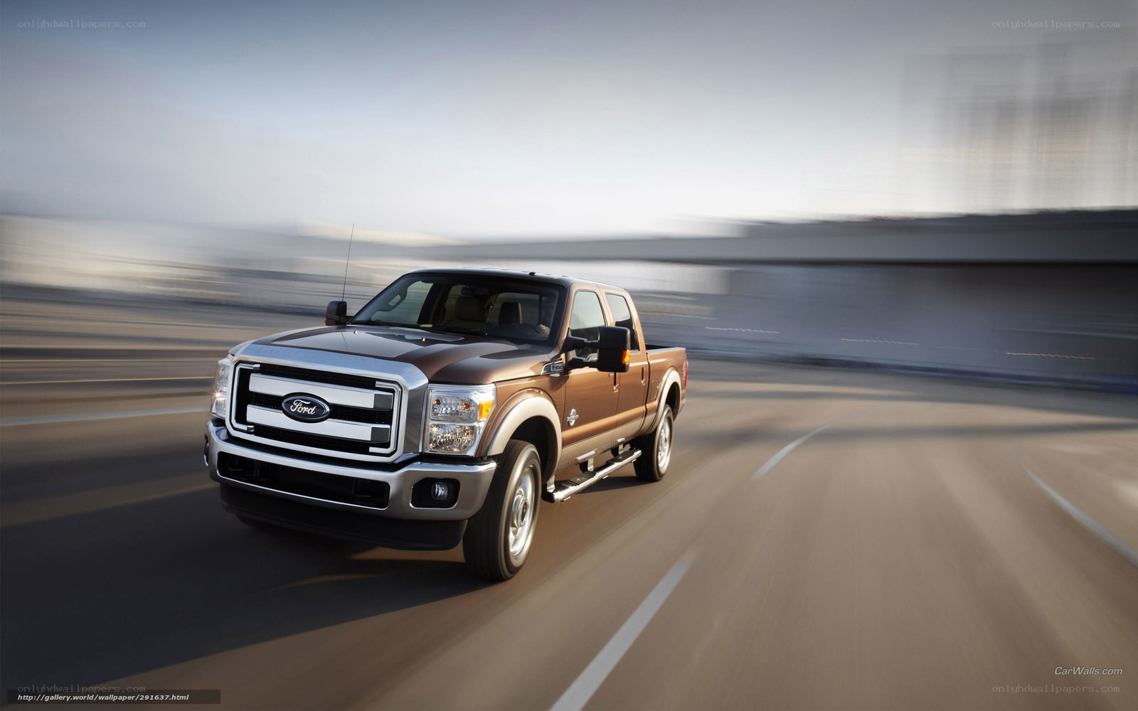 Brown Ford F-250 driving on road