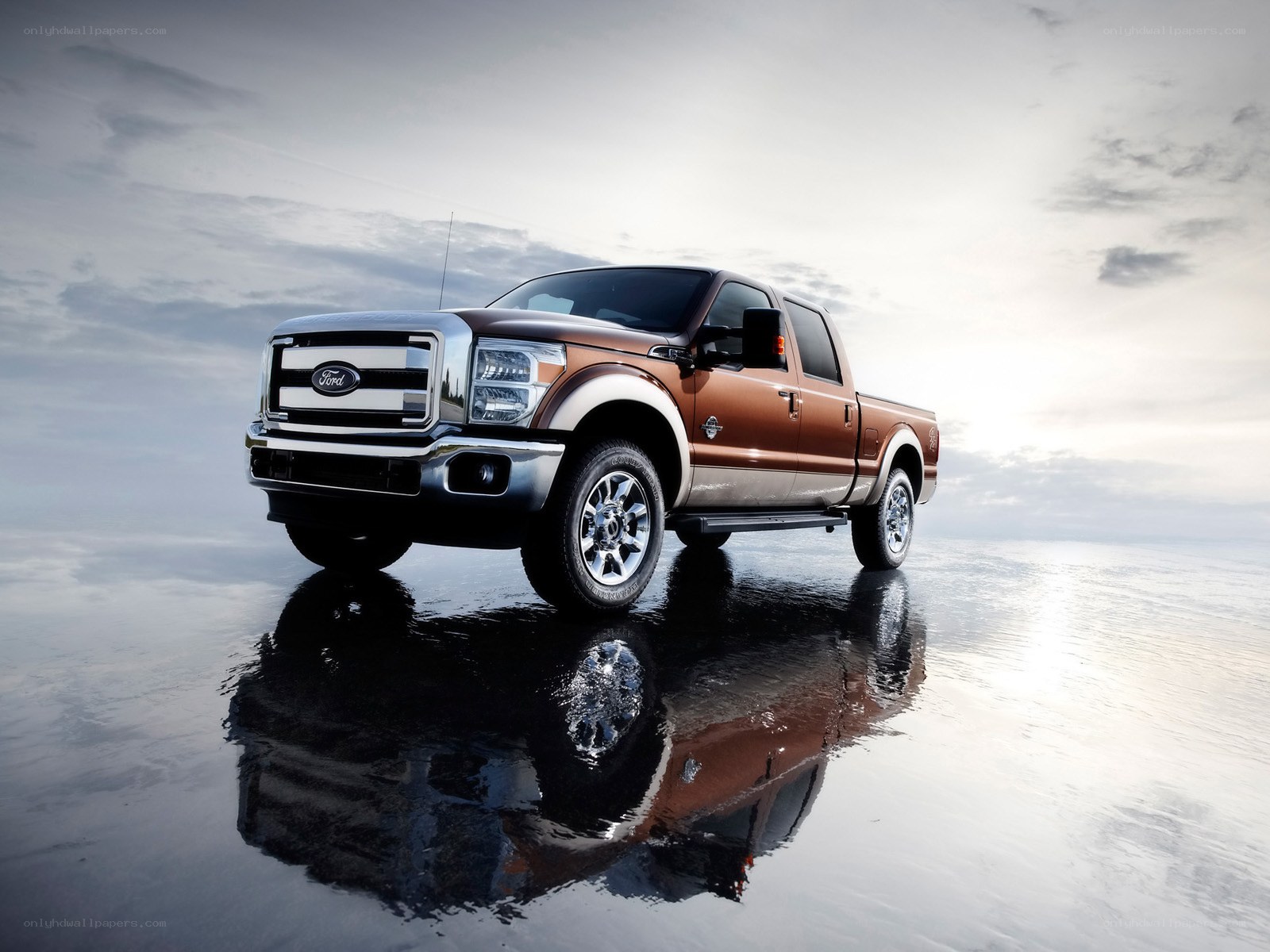 Brown Ford F-250 on reflective surface