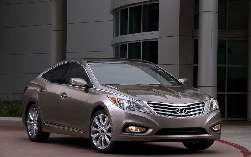 Brown Hyundai sedan parked