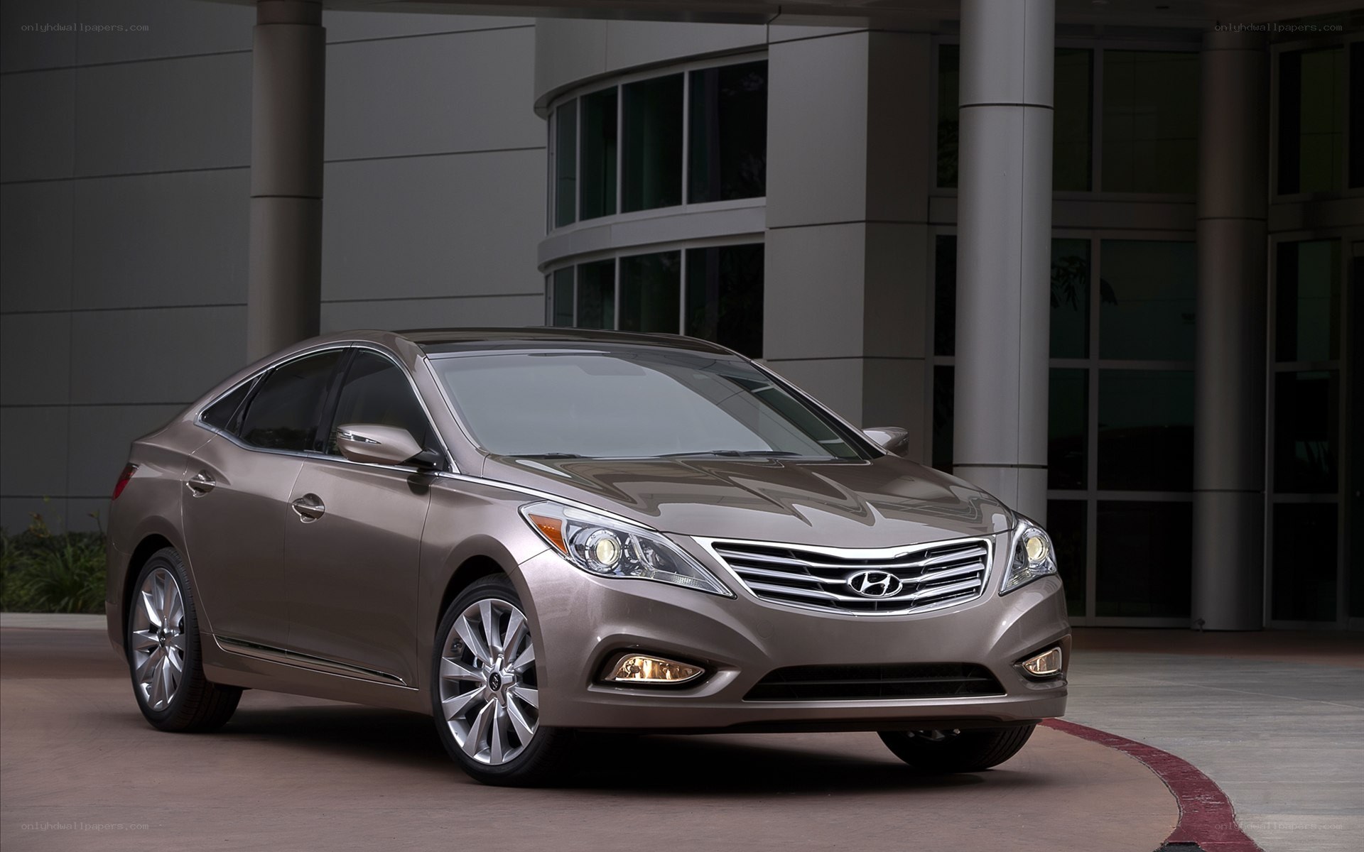 Brown Hyundai sedan parked outside