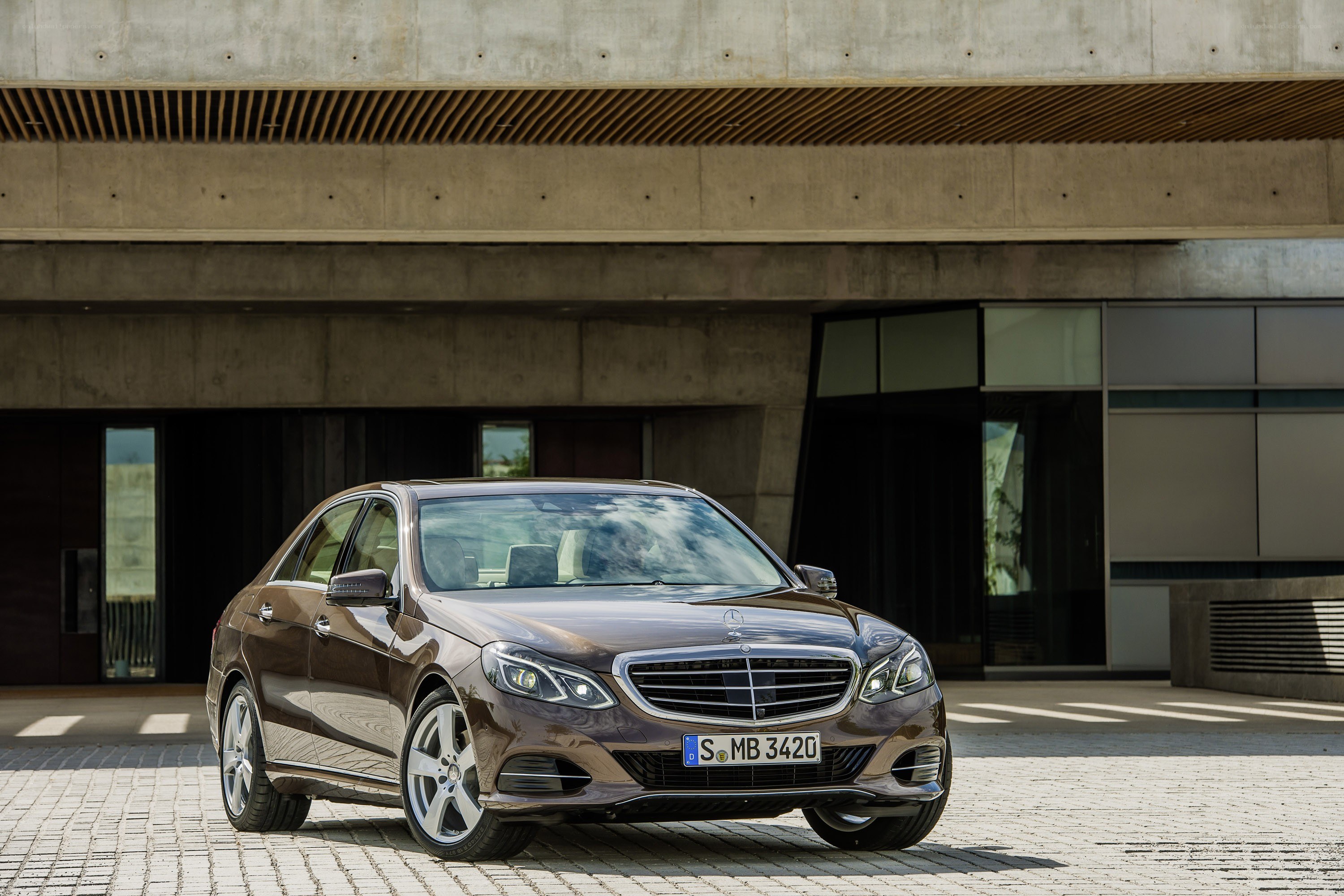 Brown Mercedes-Benz E-Class sedan