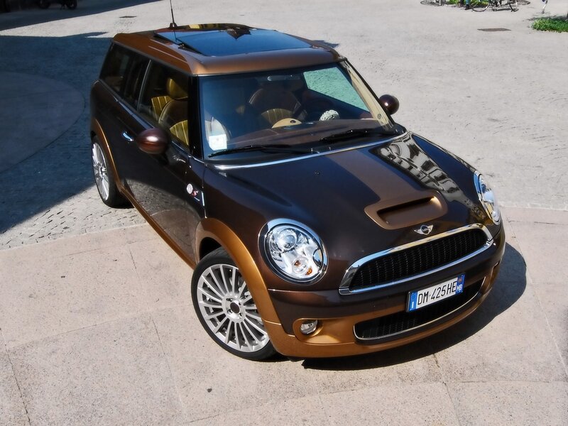 Brown MINI Cooper parked on pavement