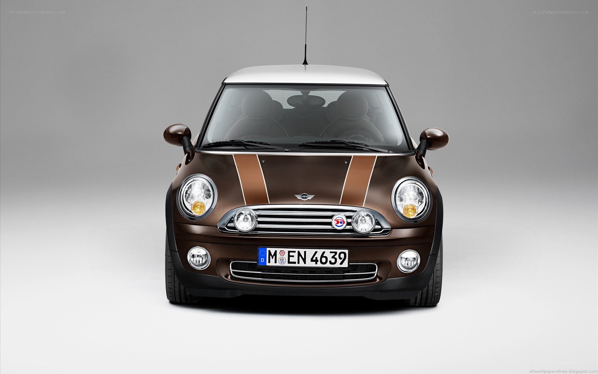 Brown Mini Cooper with stripes