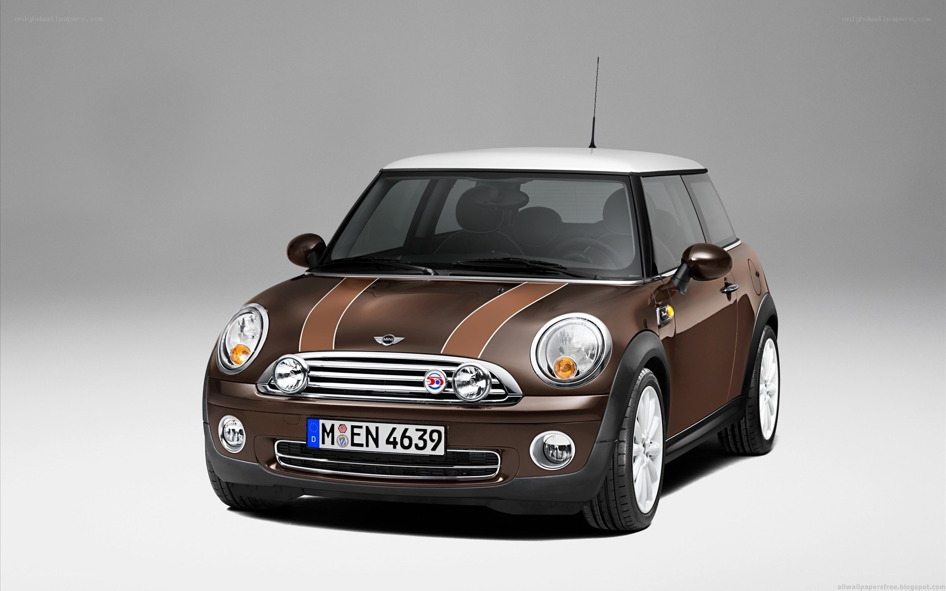Brown Mini Cooper with white roof