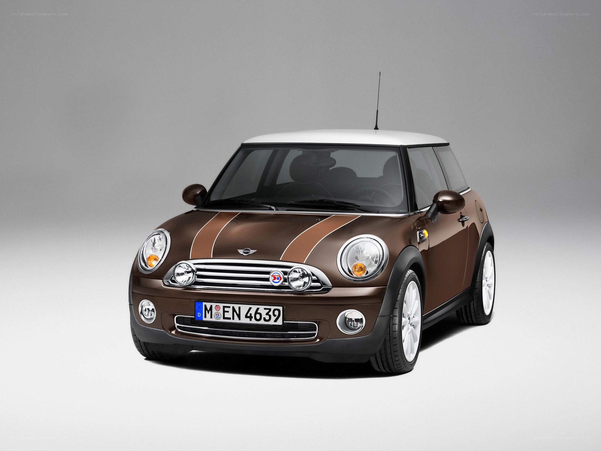 Brown Mini Cooper with white roof