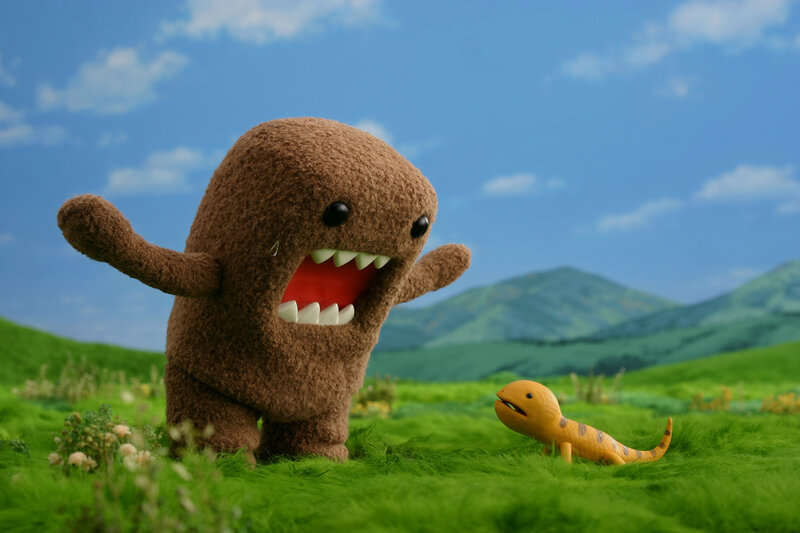 Brown Monster in Field — Green, Playful, Afternoon