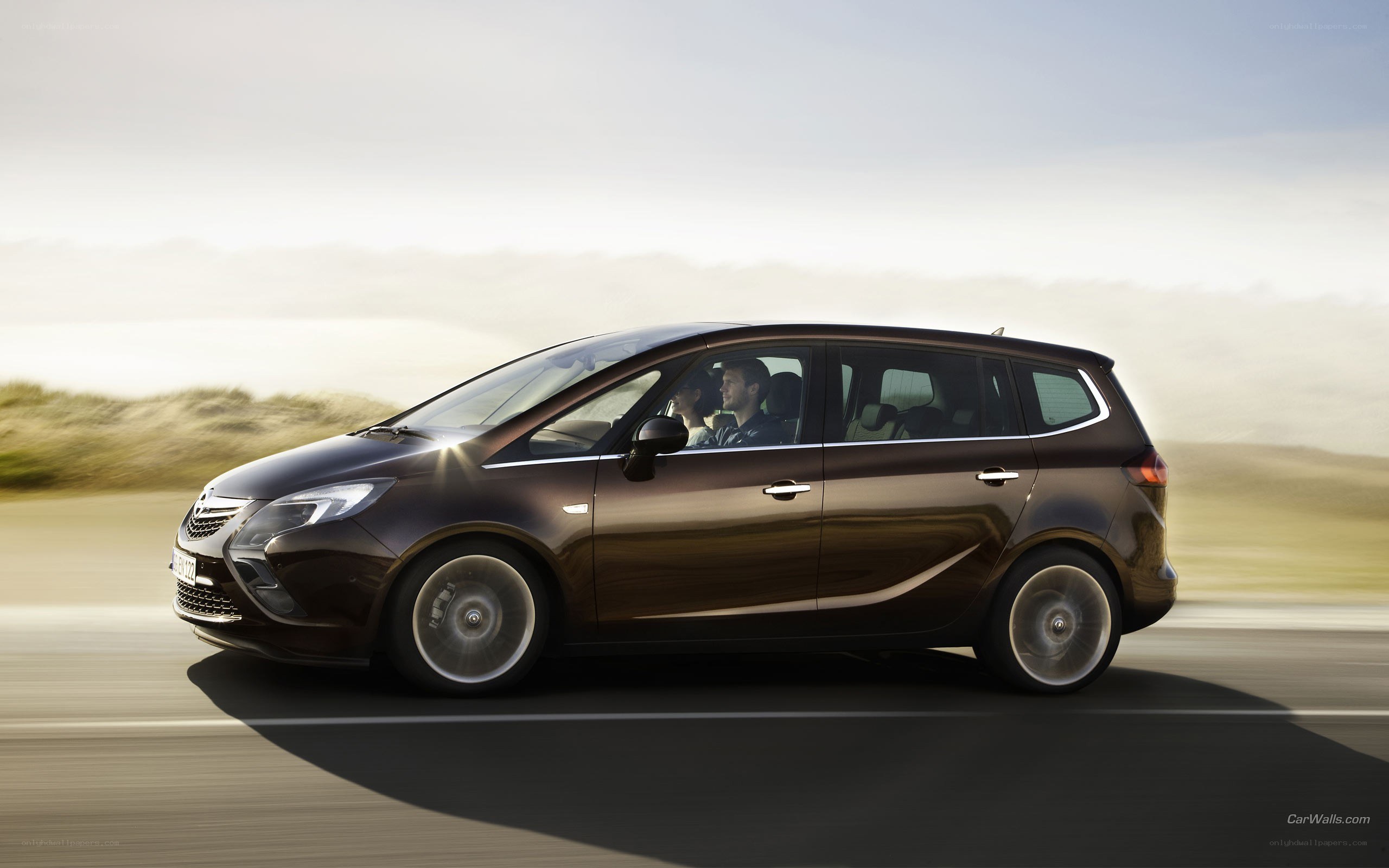 brown opel zafira in motion