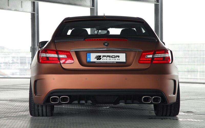 brown performance car rear view