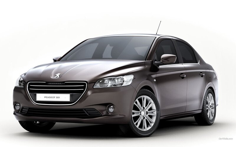 Brown Peugeot 301 Sedan — Gray