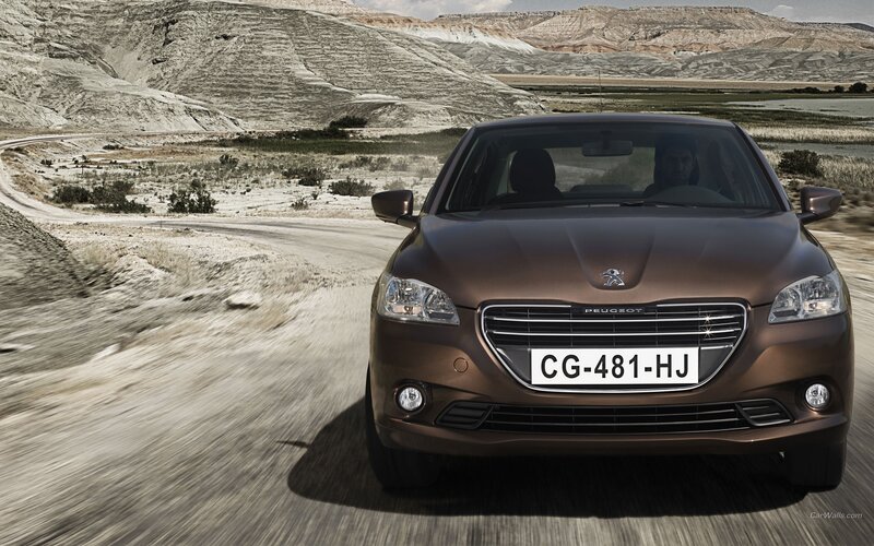Brown Peugeot Car — Dramatic