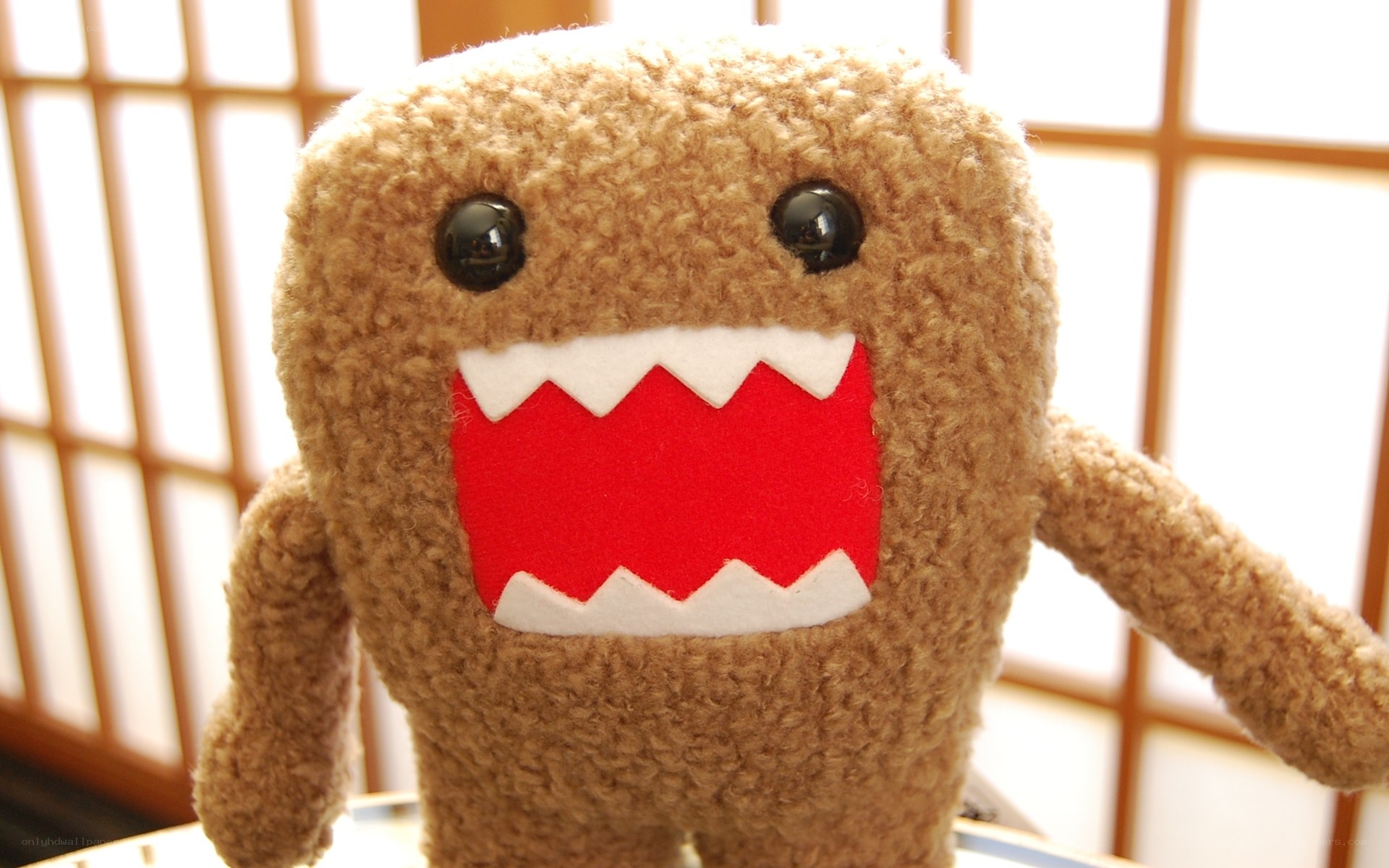 brown plush domo doll
