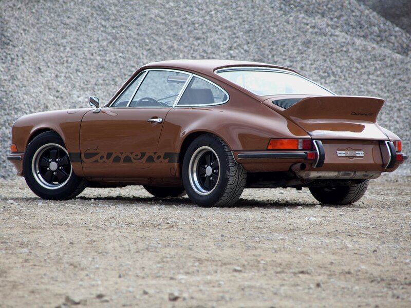 Brown Porsche Carrera sports car