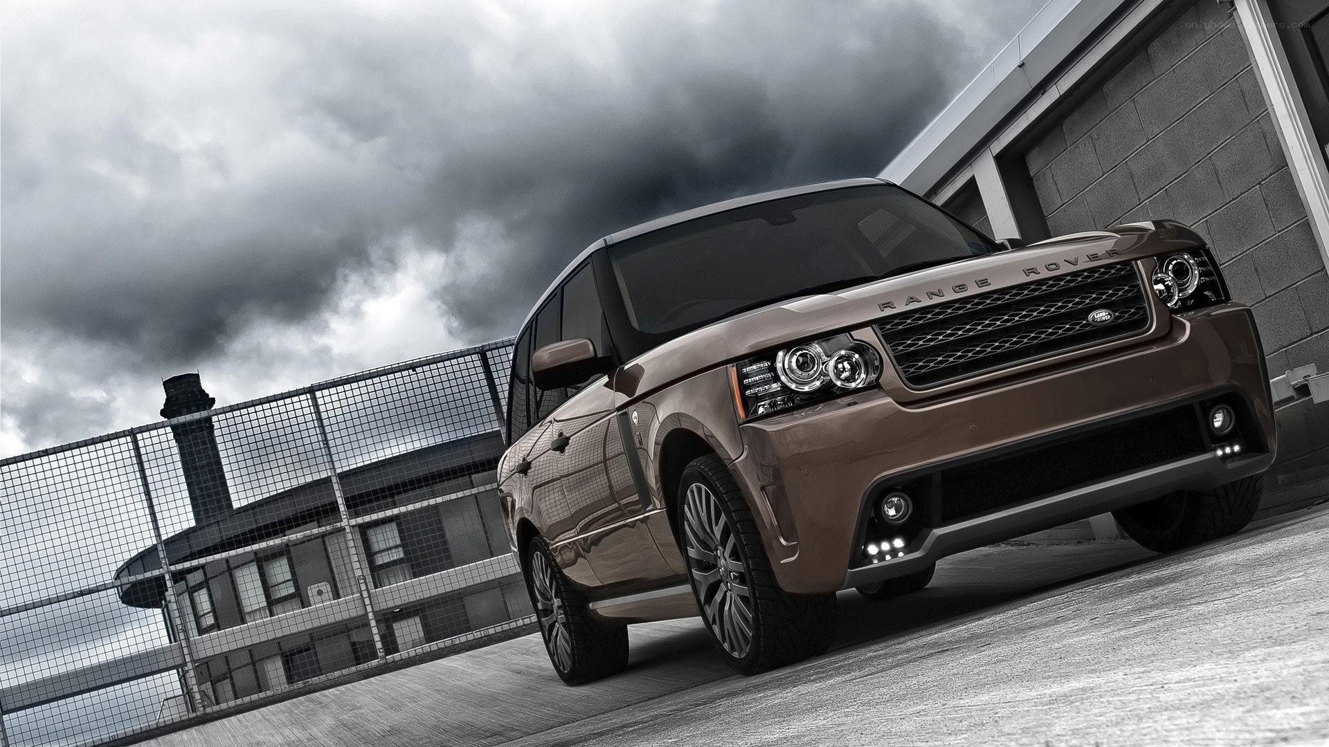 Brown Range Rover on rooftop
