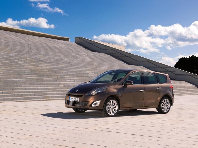 Brown Renault Scenic parked on steps