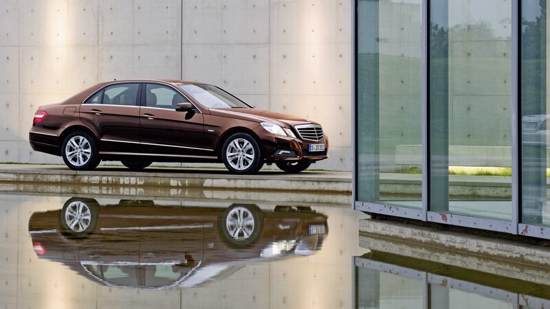 Brown Sedan Car — Serene, Afternoon, Photograph, Concrete Wall