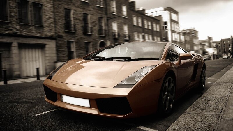 Brown Sports Car — Dramatic, Photograph, Building