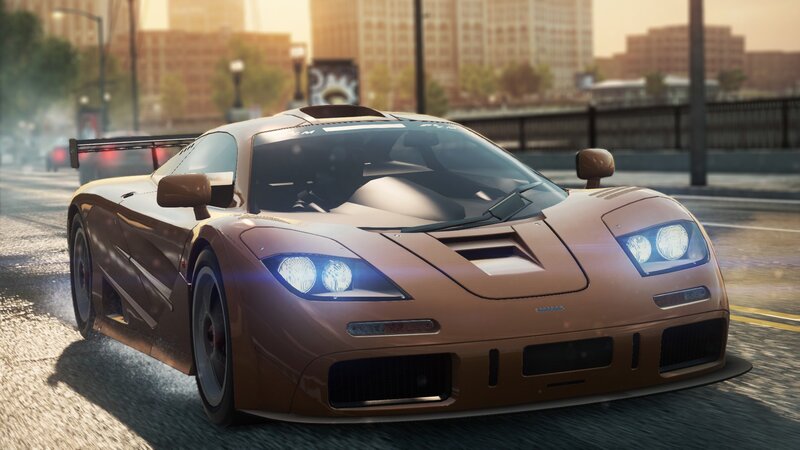 brown sports car on city street