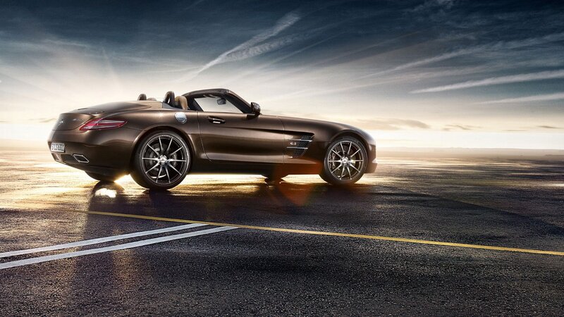 Brown sports car on road