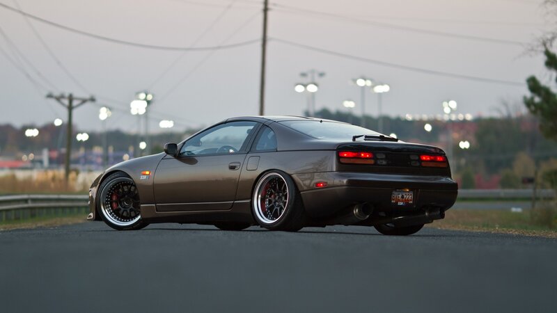 brown sports car on road