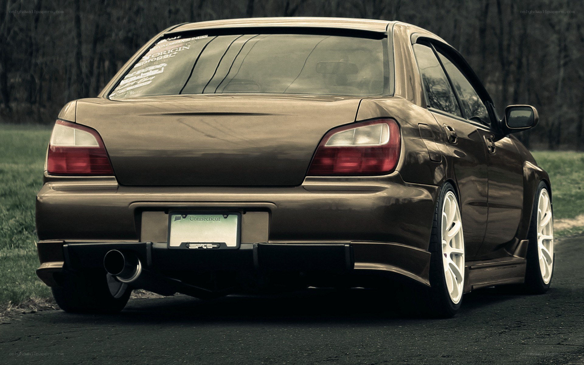 brown subaru wrx sedan