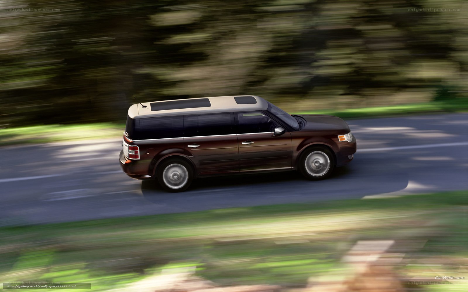 brown suv driving on road