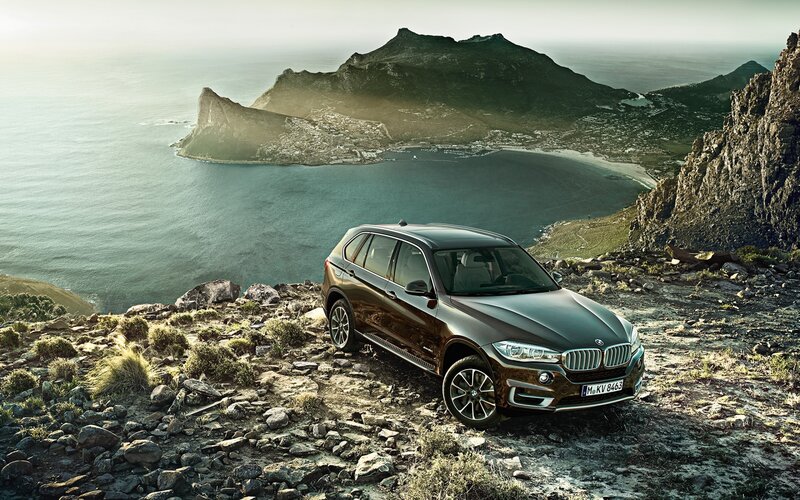 Brown SUV on Cliff