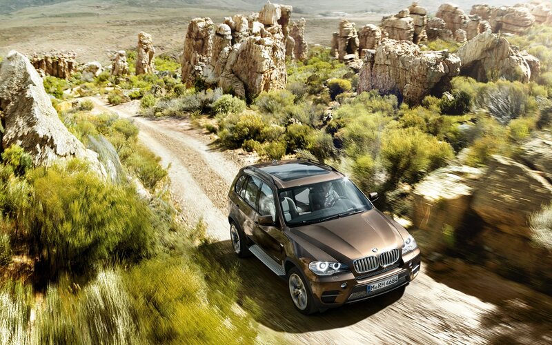 Brown SUV on Dirt Road