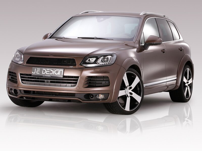 brown SUV with custom wheels