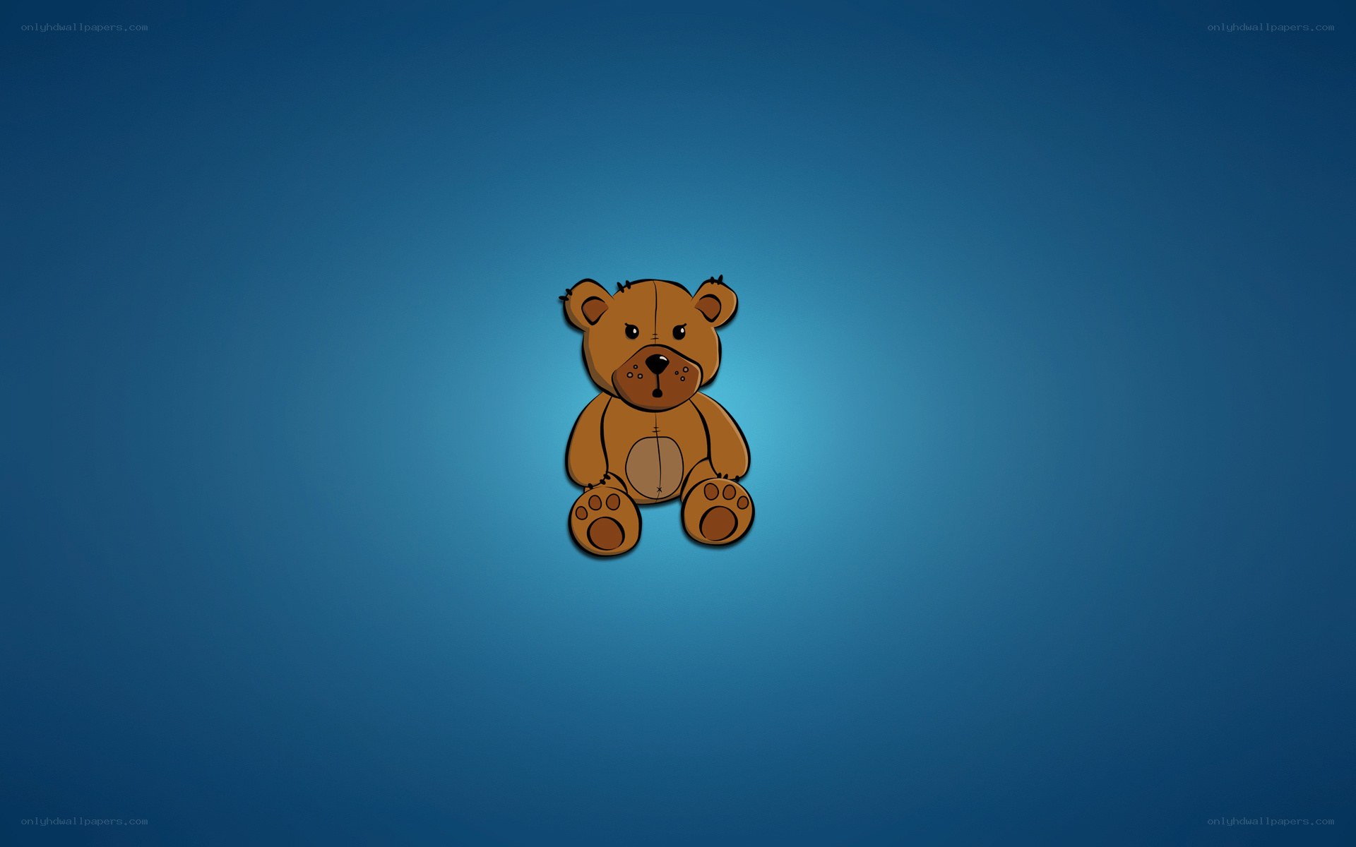 brown teddy bear on blue