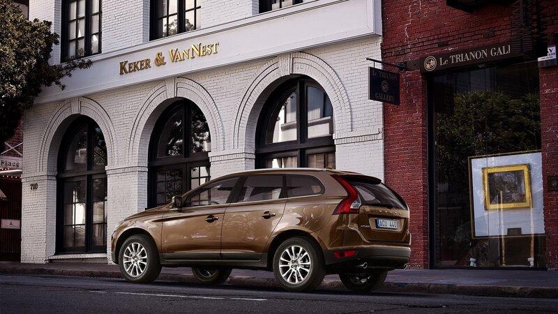 Brown Volvo XC60 on city street