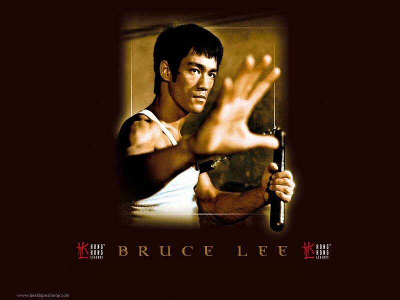 Bruce Lee Holding Nunchucks