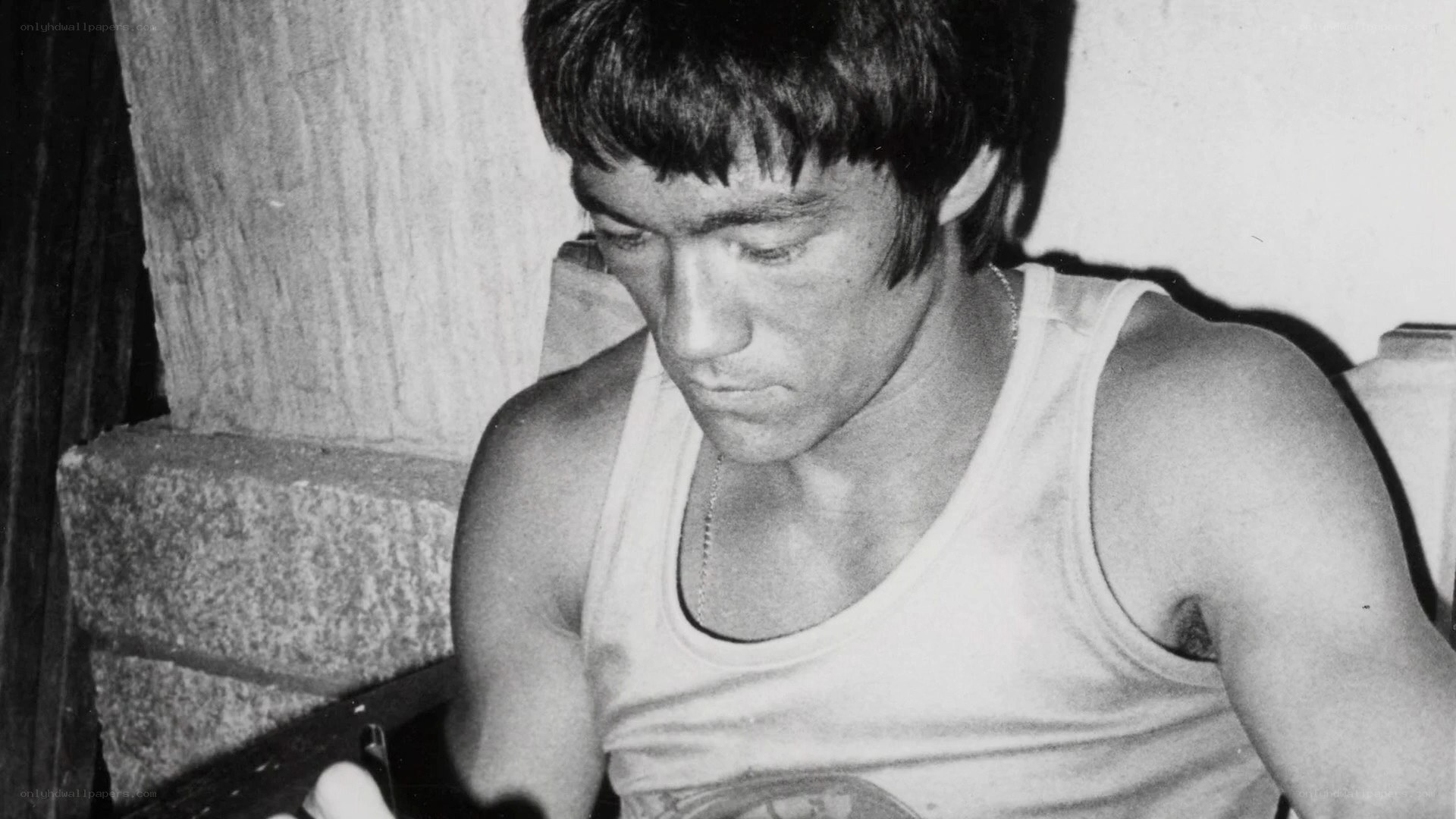 Bruce Lee in a tank top