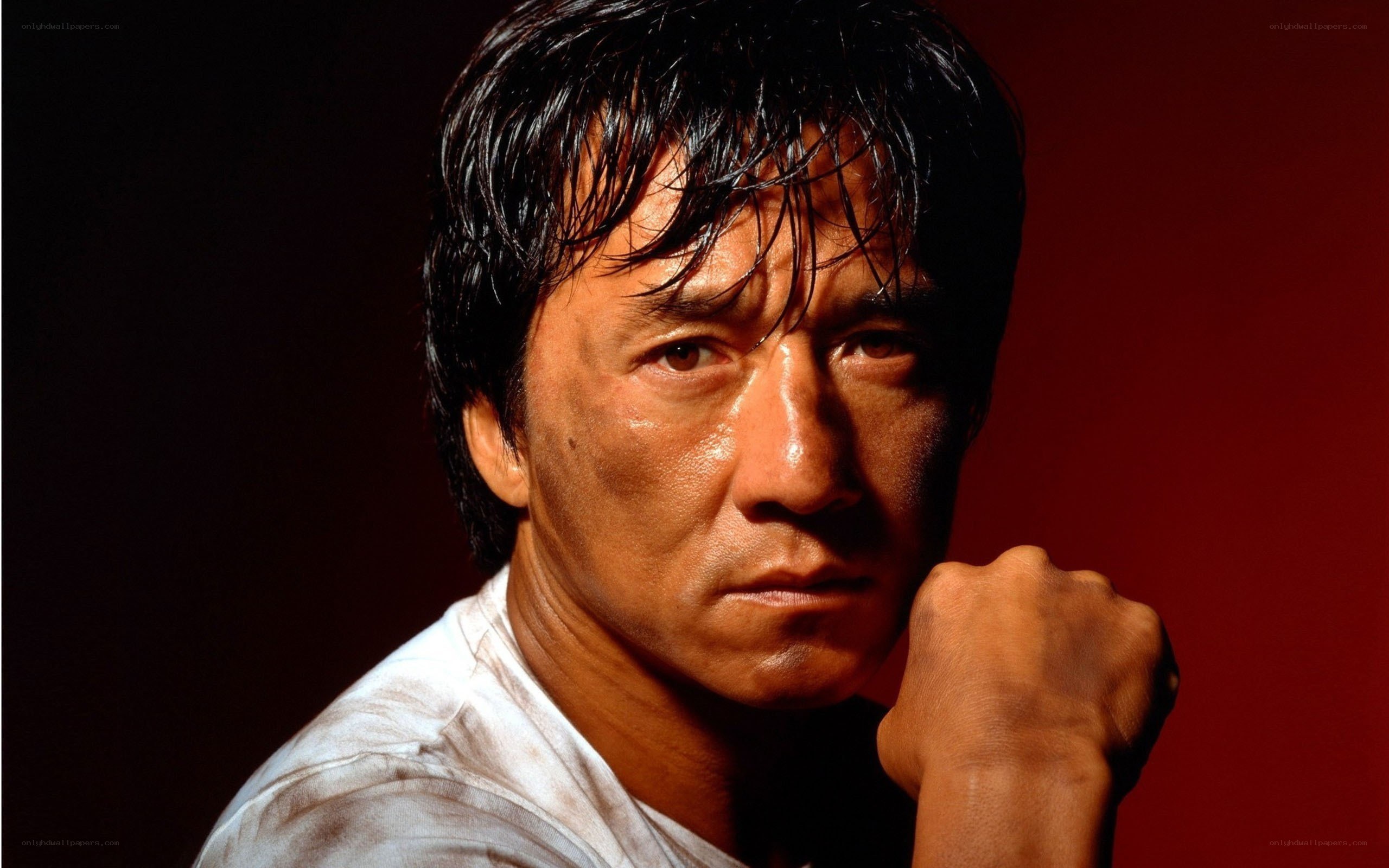 Bruce Lee in a white shirt