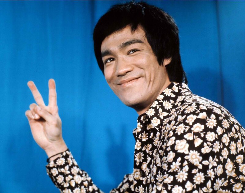 Bruce Lee making peace sign