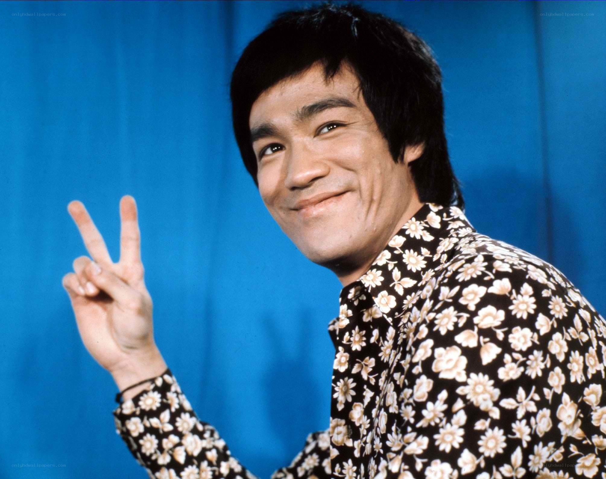 Bruce Lee making peace sign