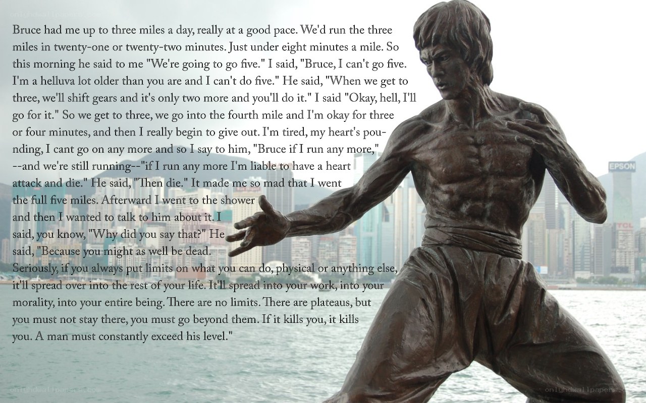 Bruce Lee statue with quote