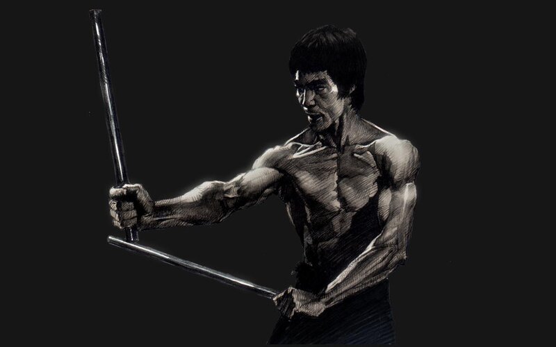 Bruce Lee with nunchucks