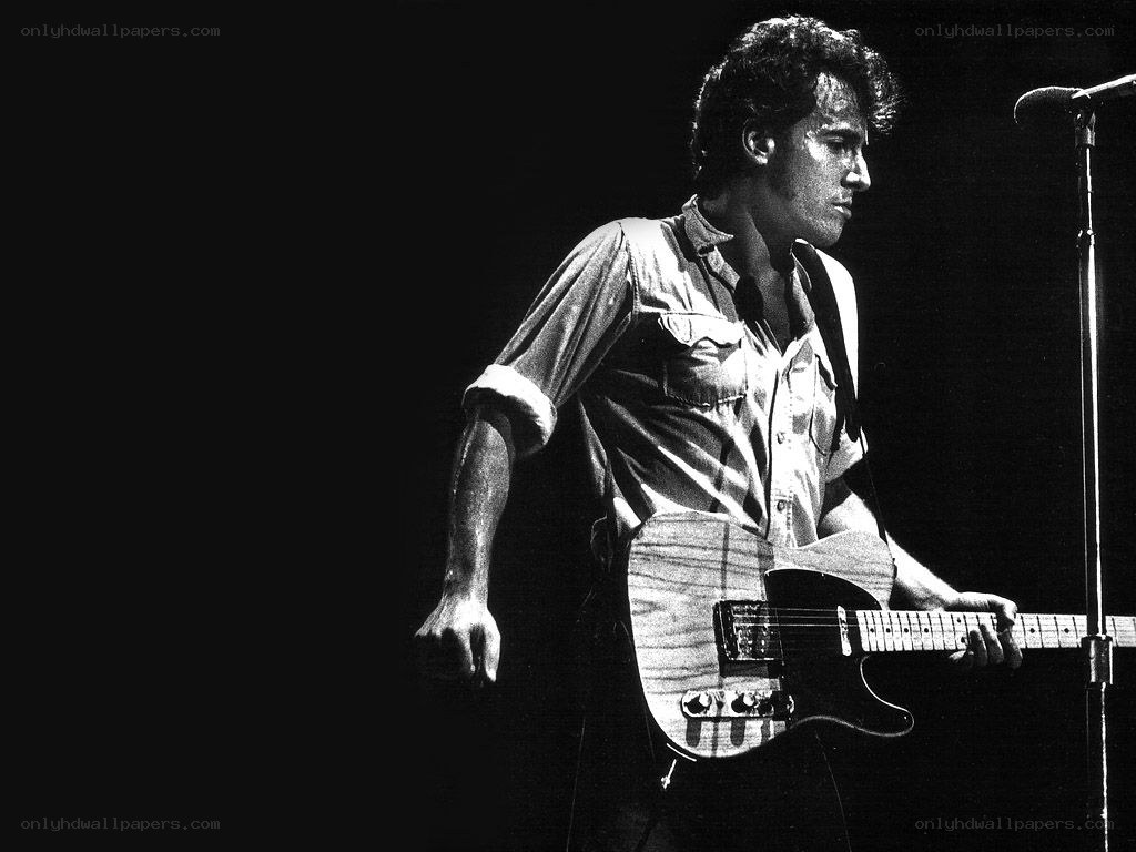 Bruce Springsteen on stage with guitar