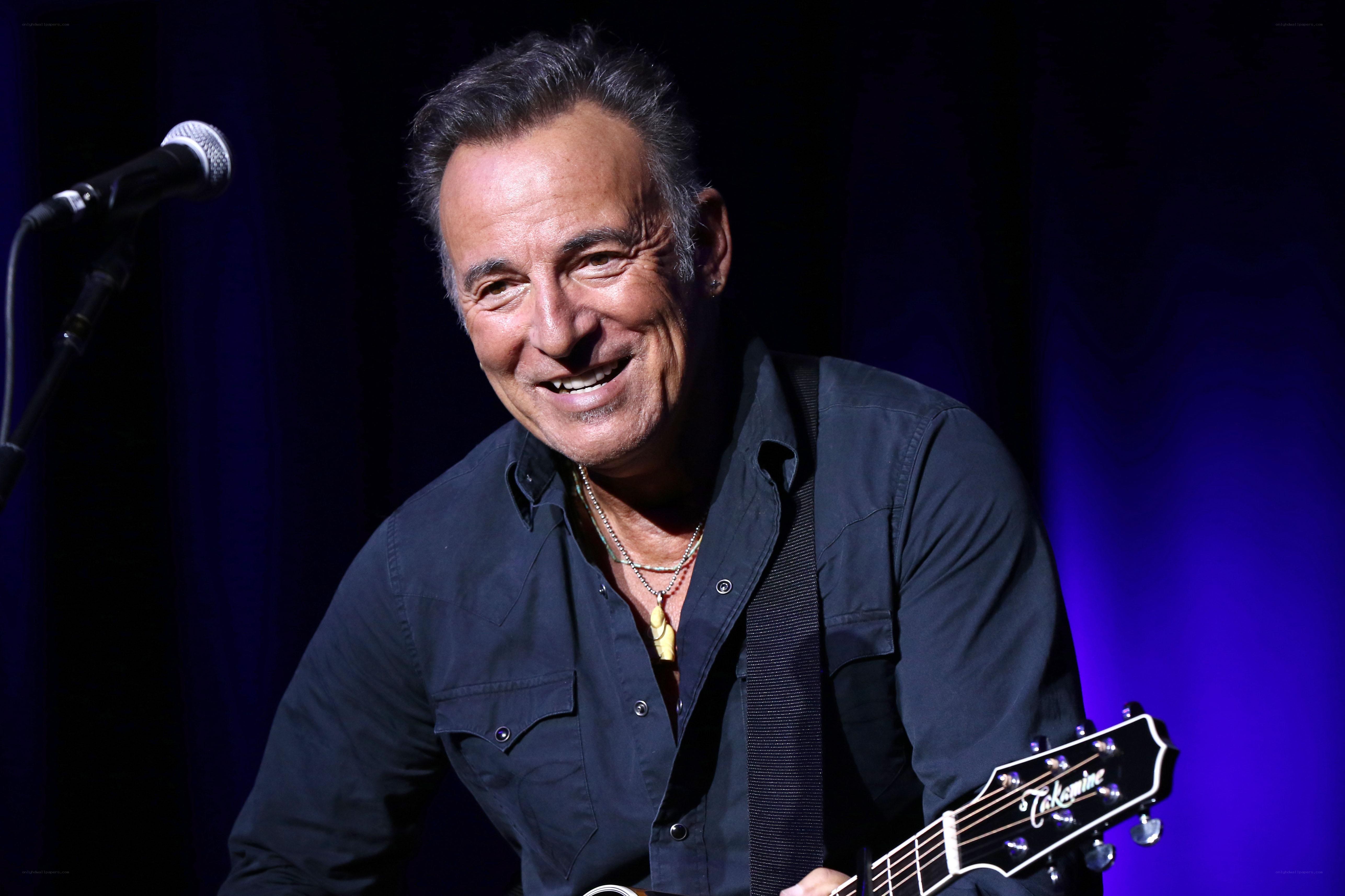 Bruce Springsteen on stage with guitar