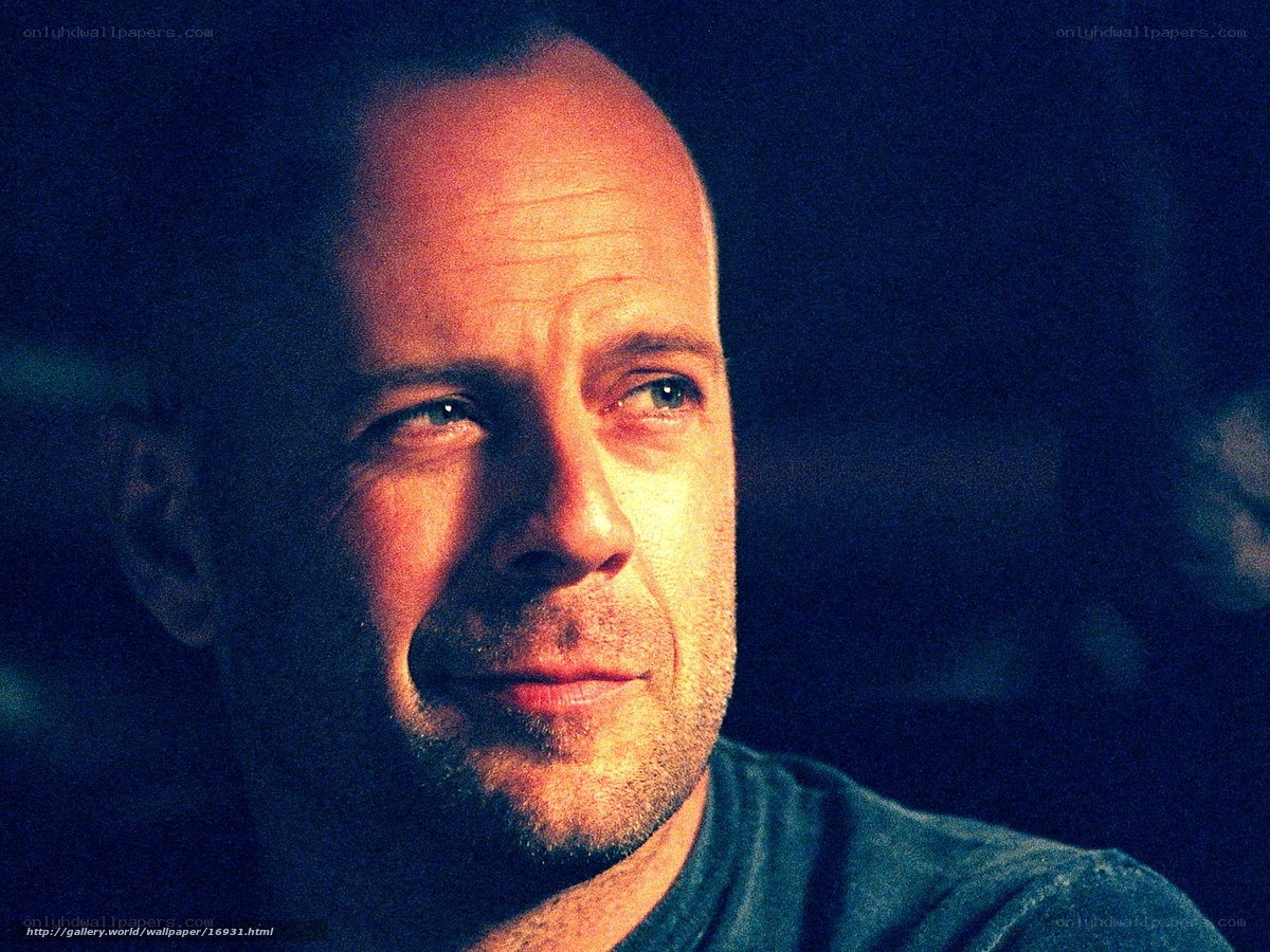 Bruce Willis in a dimly lit scene