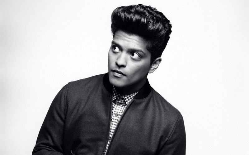 Bruno Mars in a black-and-white portrait