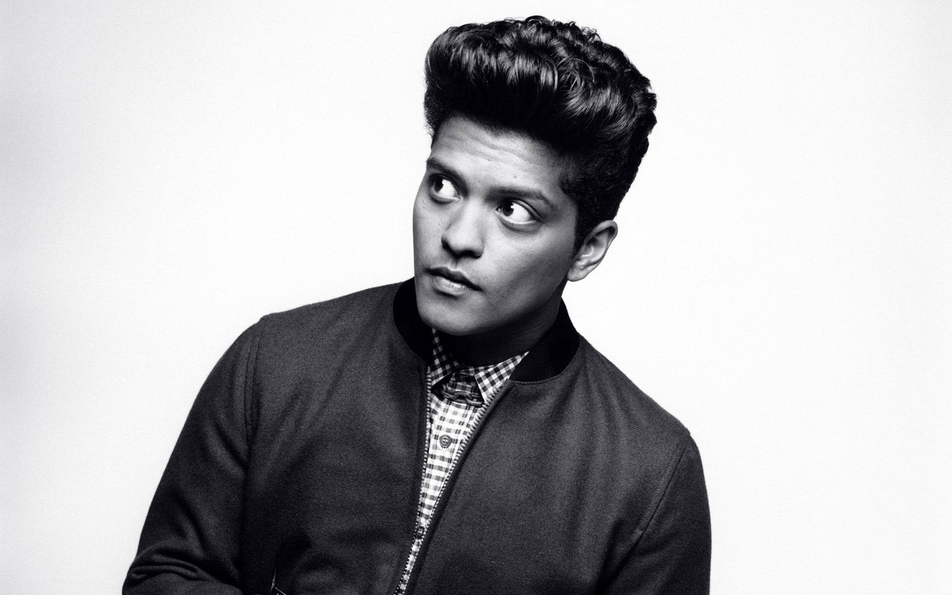 Bruno Mars in a black-and-white portrait