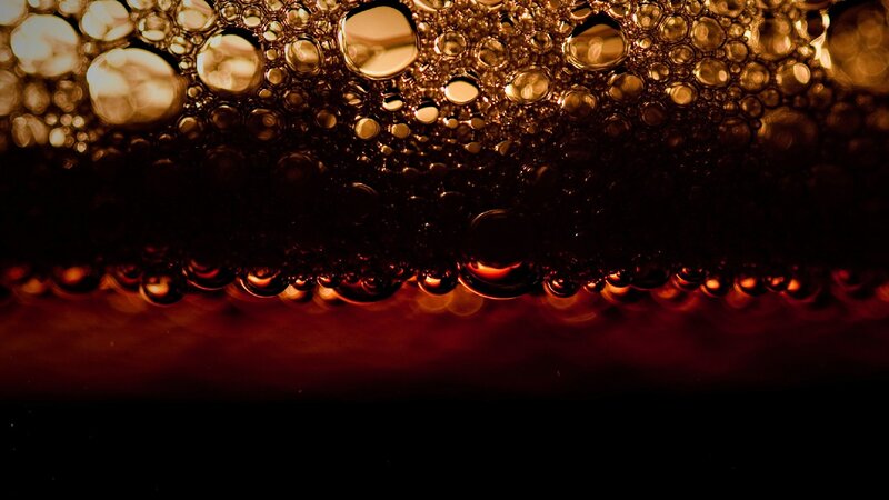 Bubbles in Dark Liquid — Brown, Photograph