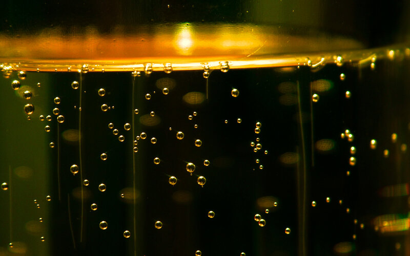 bubbles in golden liquid